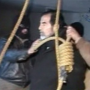 Last moments of Saddam Hussein, about to be hanged by Iraqis for crimes against Iraqis