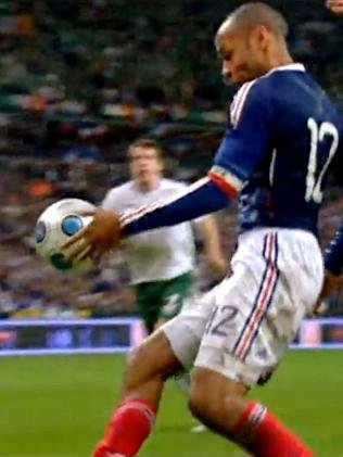 Thierry Henri's left hand sets up France's winning goal against Ireland